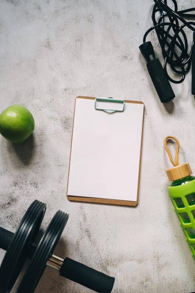 pexels-photo-8155197 Overhead Shot of Exercise Equipment and a Clipboard